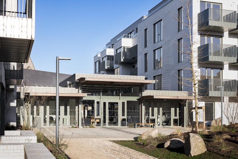 An exterior courtyard view of the modern commercial window systems Ireland and commercial doors Ireland of The Lookout development in Dalkey.